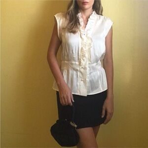 Beautiful silk cream colored blouse by Robert Graham. Size medium.